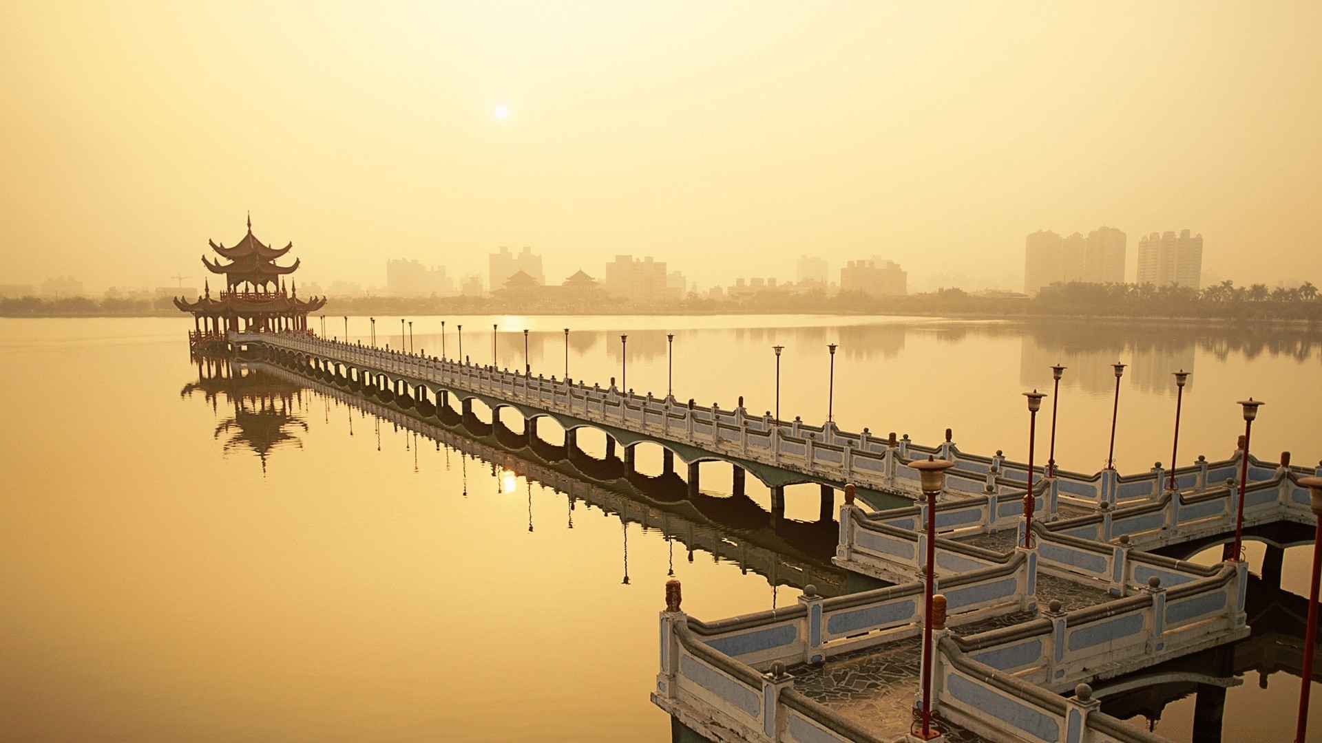 otras ciudades agua amanecer puente puesta de sol río reflexión viajes muelle lago cielo mar noche paisaje al aire libre anochecer sistema de transporte barco