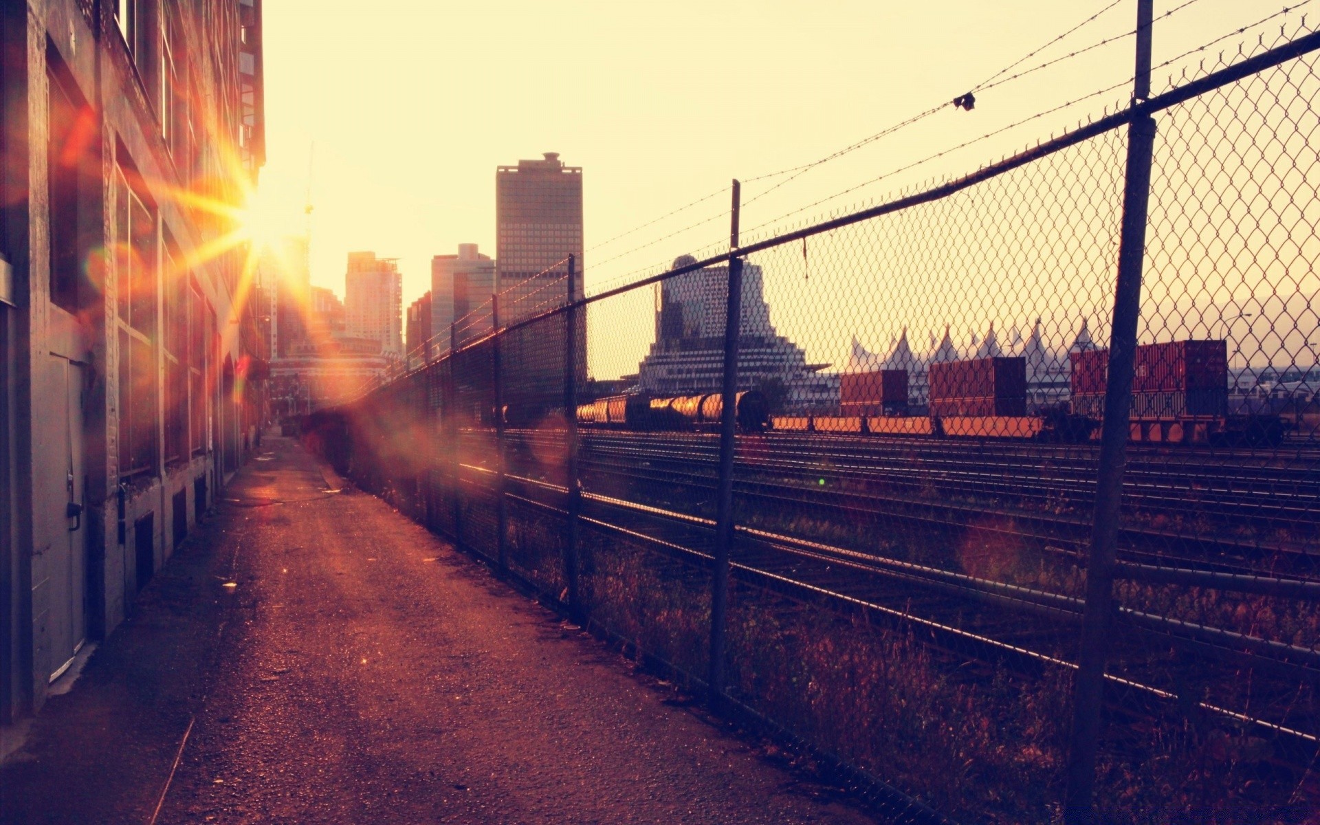 outras cidades ponte sistema de transporte viagens cidade urbano trem carro luz estrada pôr do sol casa arquitetura indústria rua ferrovia água aço noite