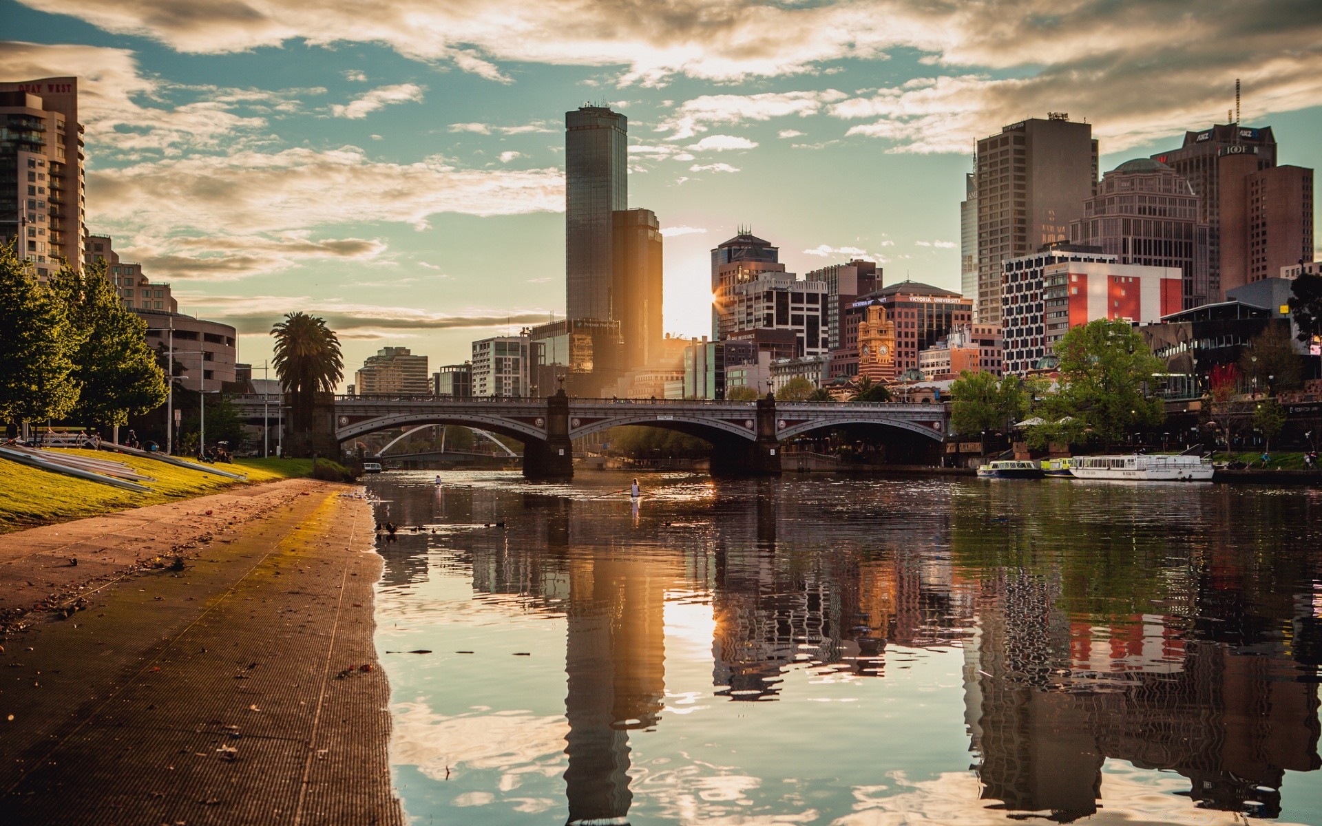 other city city architecture water travel river building reflection cityscape skyline urban sky outdoors sunset downtown bridge skyscraper dusk evening