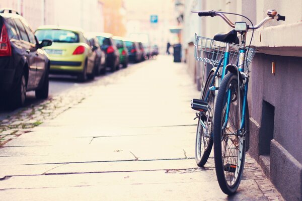 The bike is parked near the building