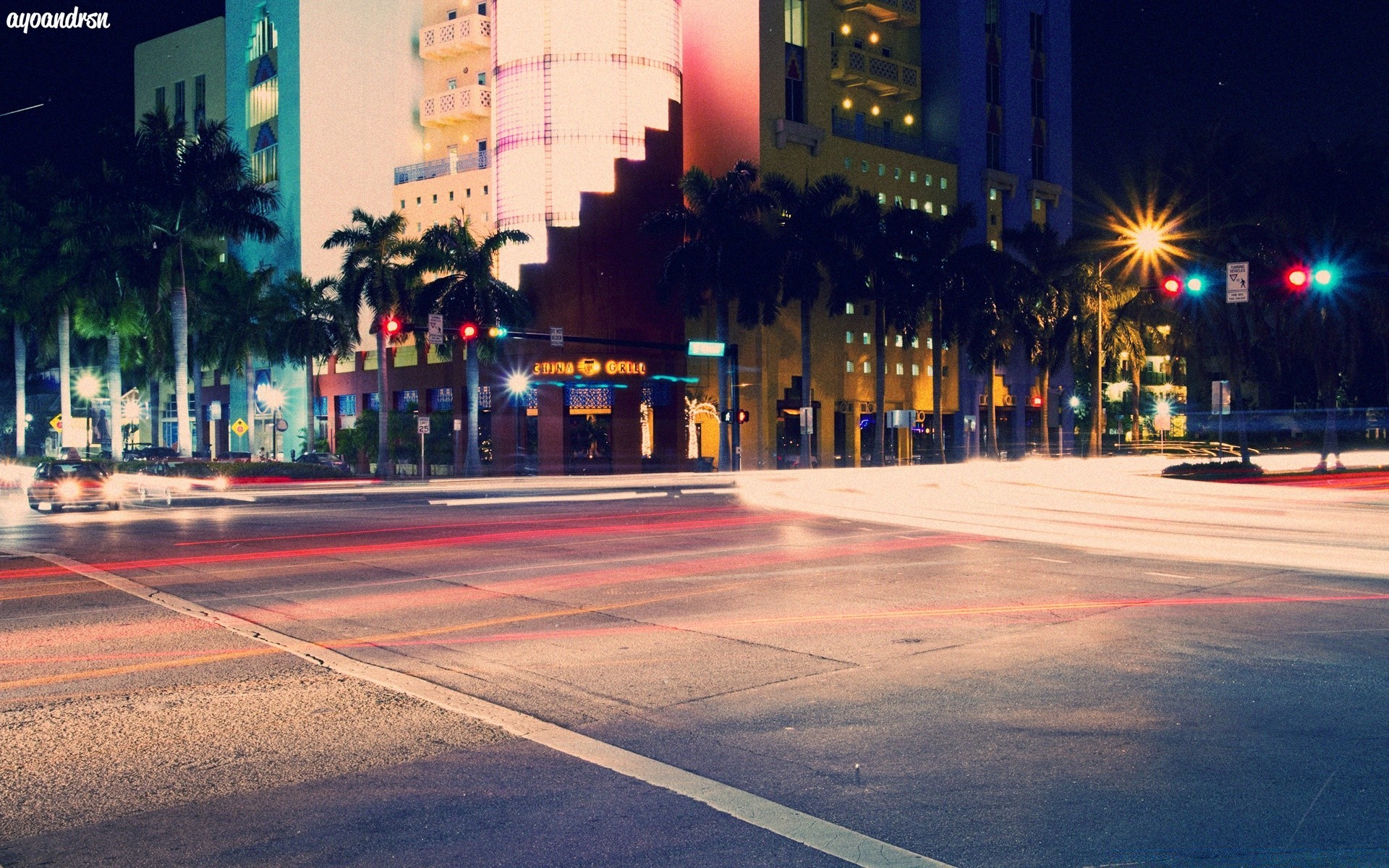 other city street road city travel downtown traffic dusk evening skyscraper blur architecture business urban car illuminated building transportation system light pavement