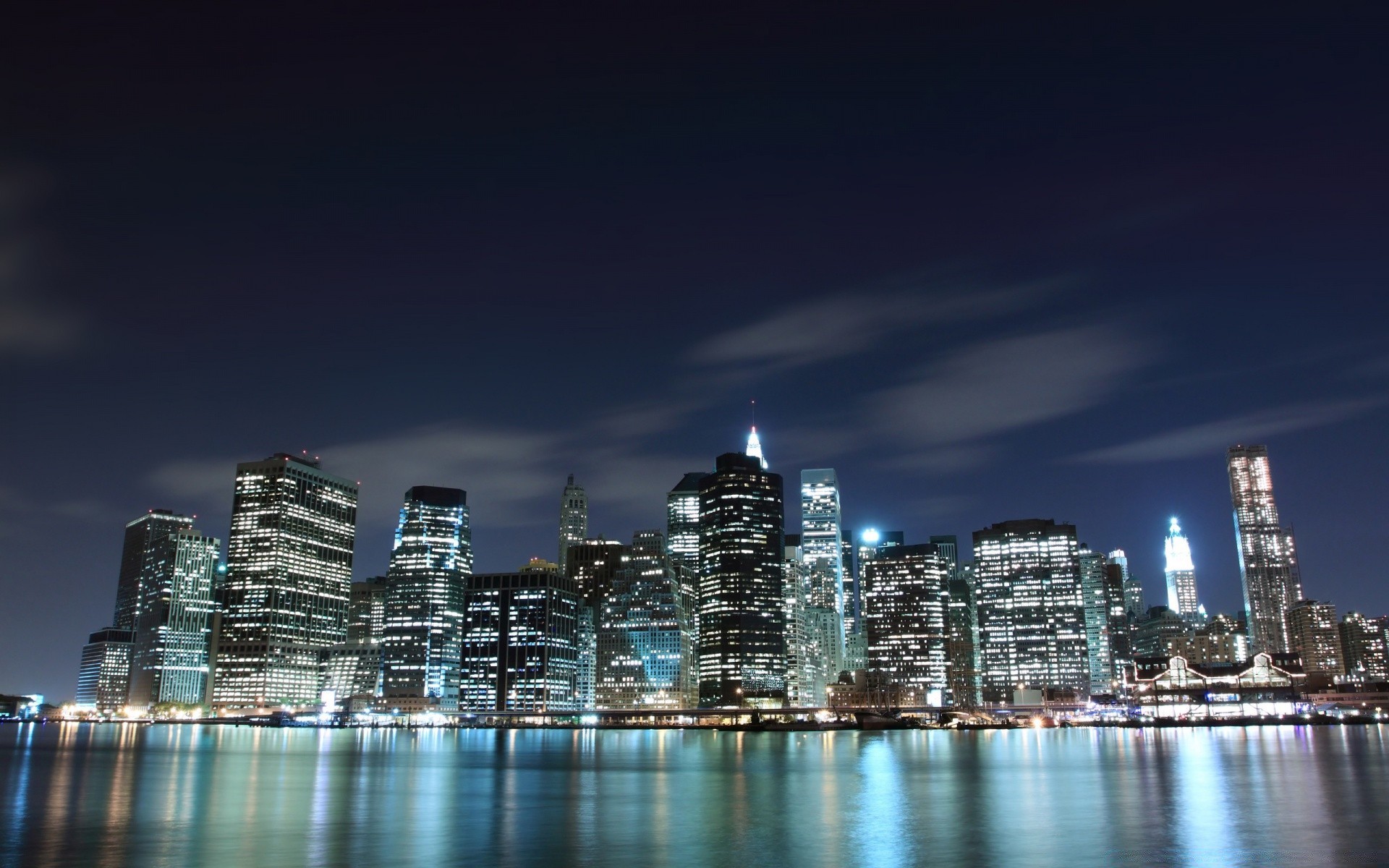 other city city skyline downtown architecture skyscraper cityscape dusk office building travel urban sky reflection finance water sunset evening modern illuminated tower