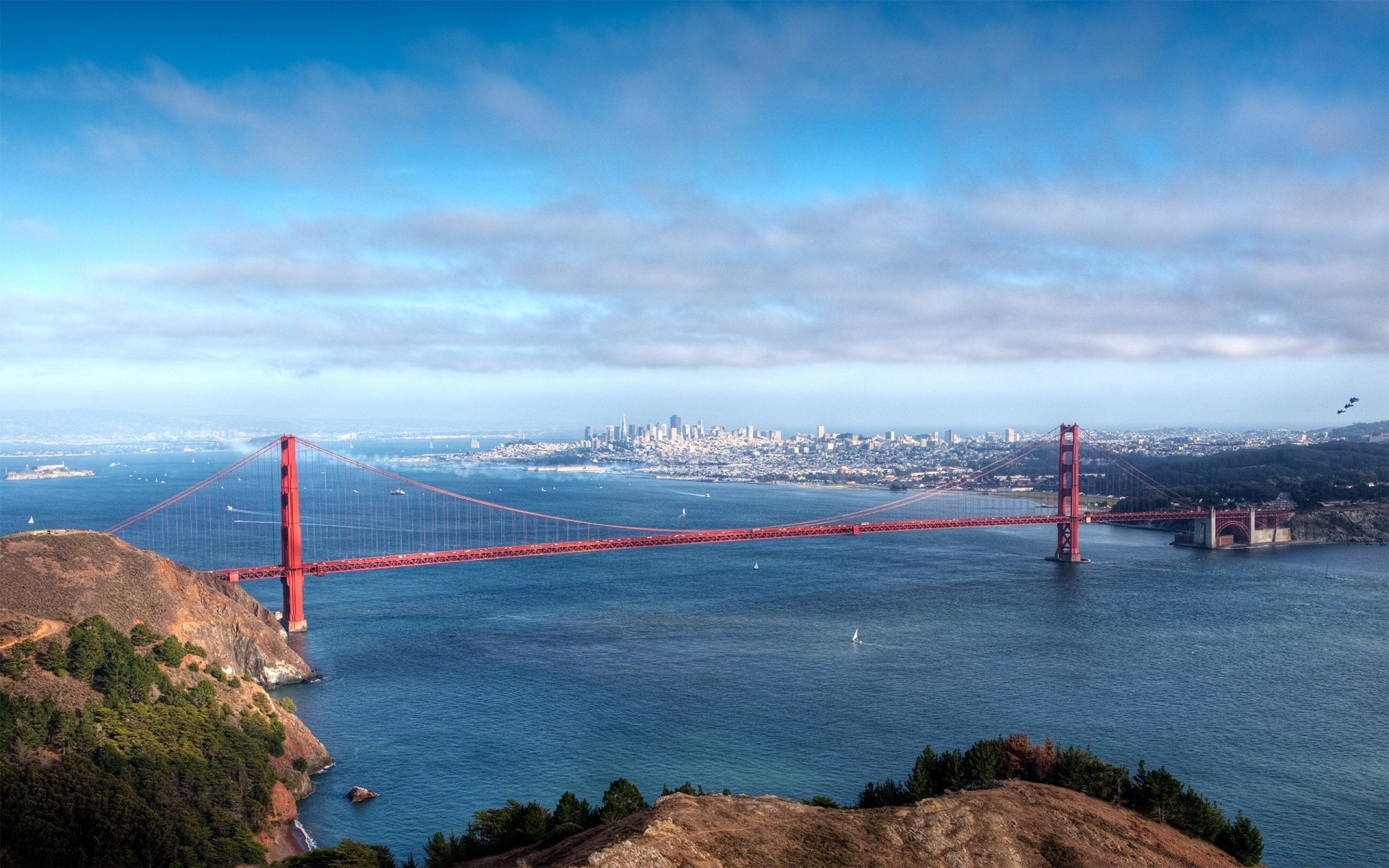 other city water travel sea architecture seashore transportation system city ocean sky bridge suspension bridge vehicle harbor watercraft beach bay landscape outdoors