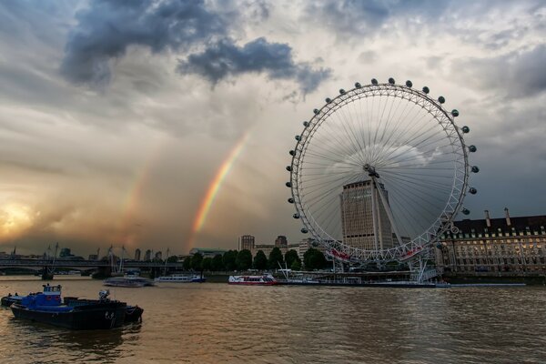 Ferris wheel on the shore of a silent lake