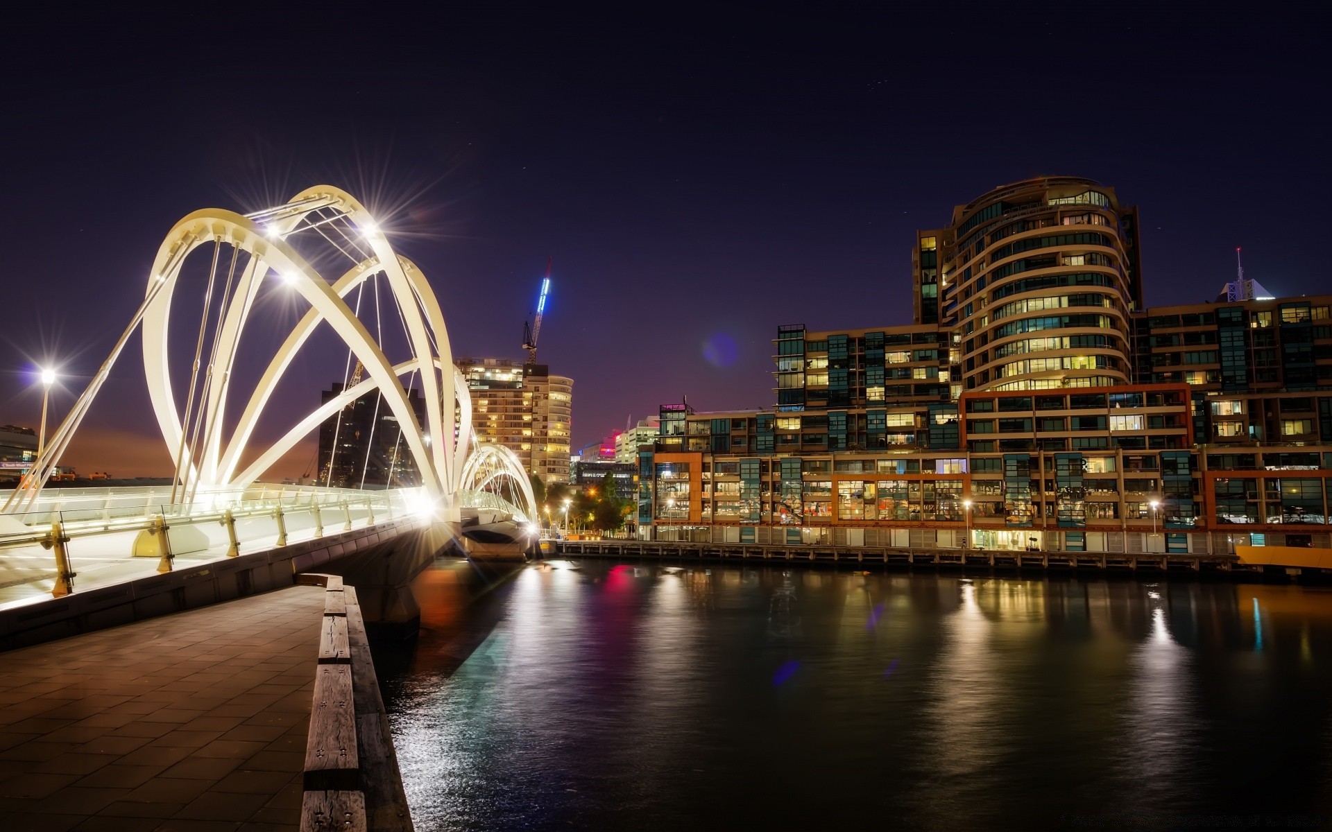 otras ciudades ciudad arquitectura puente viajes agua ciudad río casa skyline noche urbano crepúsculo cielo centro de la ciudad puesta del sol reflexión luz moderno paseo marítimo iluminado