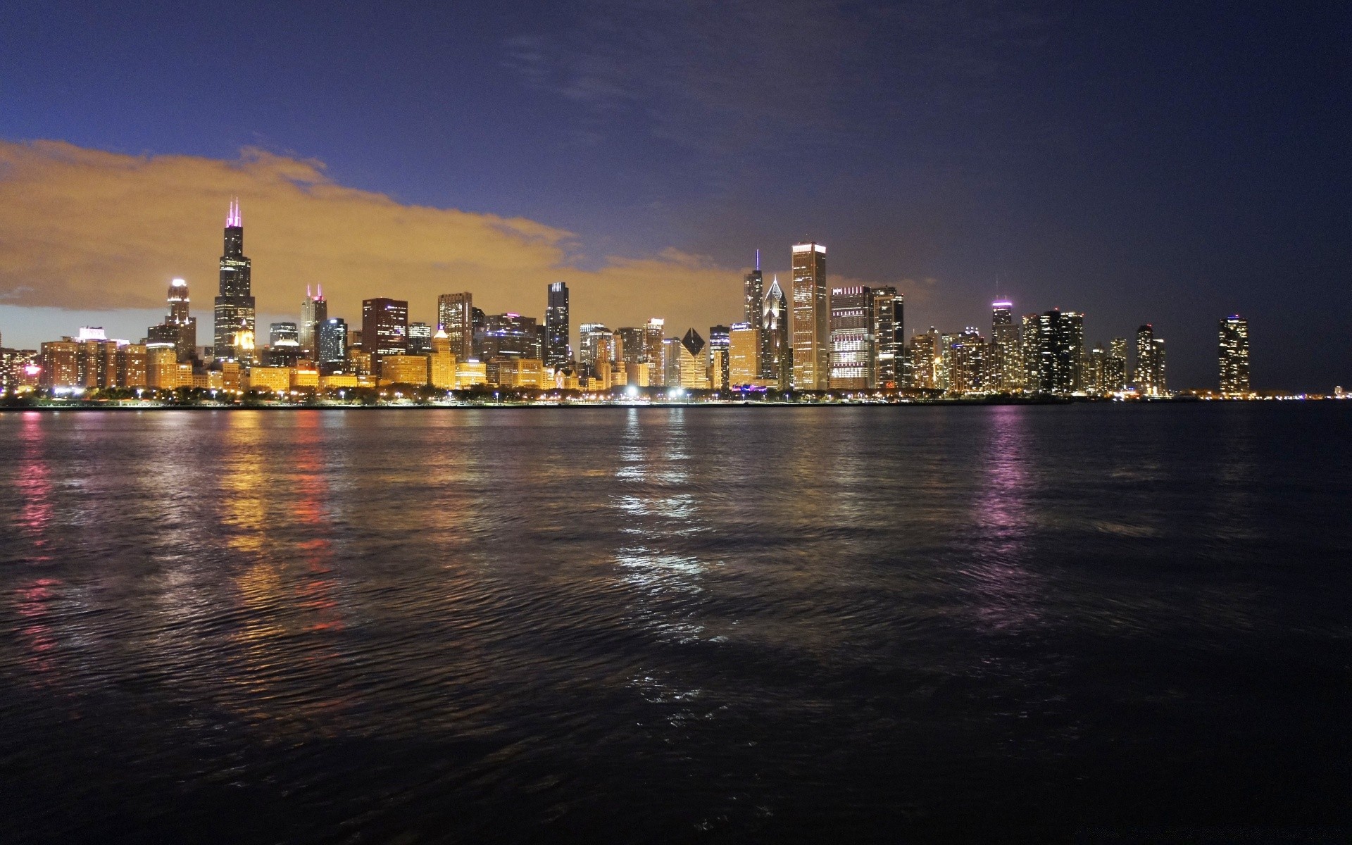 other city city skyline cityscape architecture skyscraper water building dusk river downtown reflection sunset evening sky waterfront travel urban modern office tower