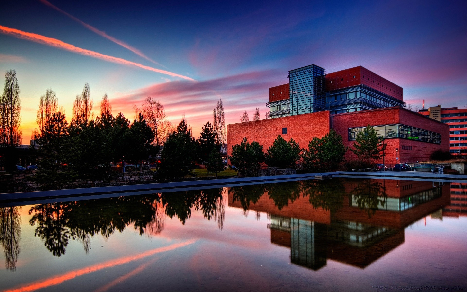 other city reflection architecture sunset water sky city dusk evening travel building river bridge outdoors