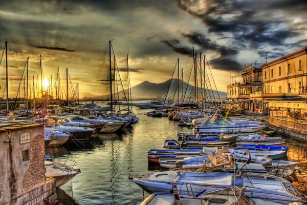 Lots of boats on the water at sunset