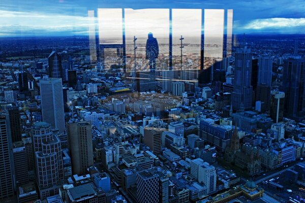 Panarama of the city from the window of a high-rise