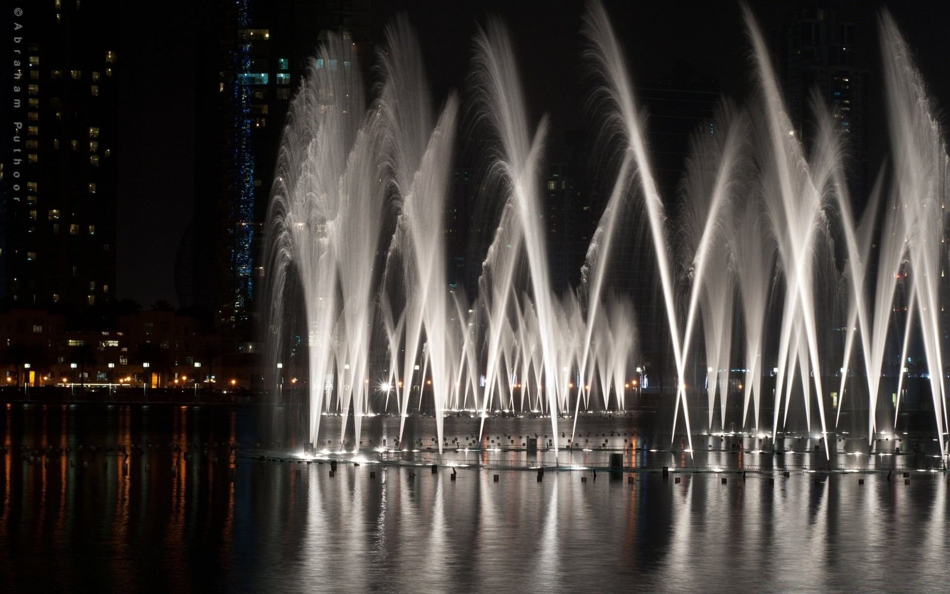 other city city water evening travel architecture dark outdoors river light fountain art sky dusk illuminated