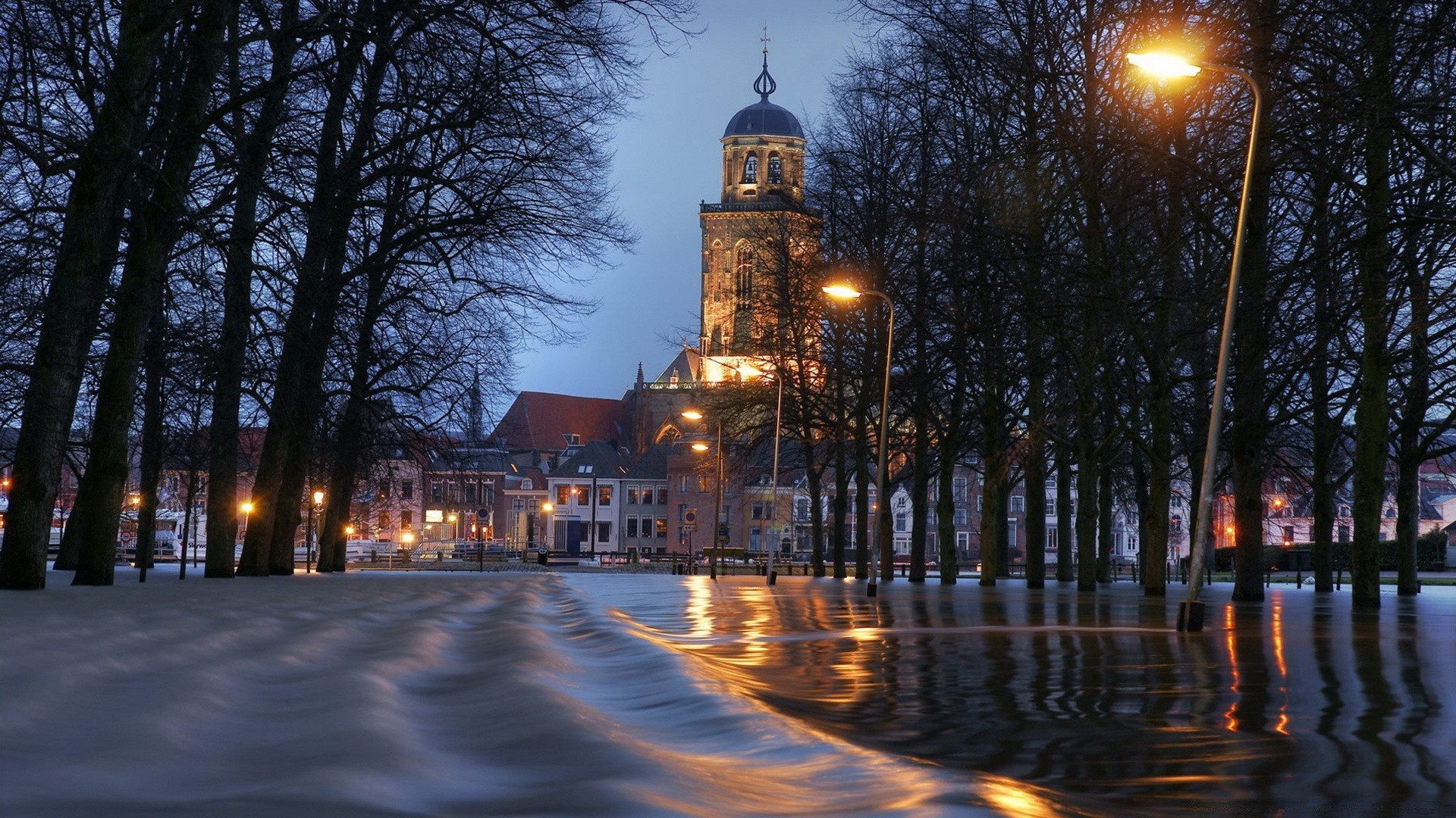 other city city architecture travel dusk evening light street water building river outdoors sunset bridge church illuminated reflection sky urban