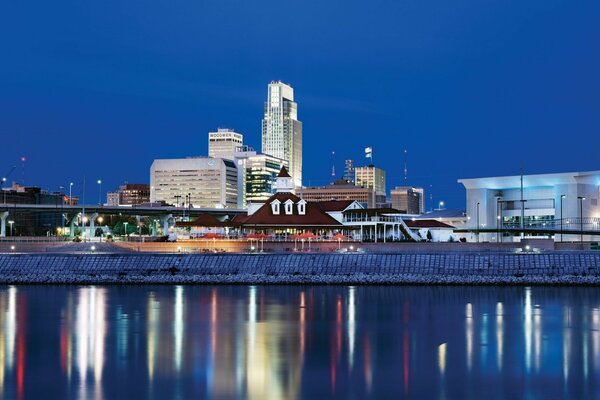 View of the night city by the river