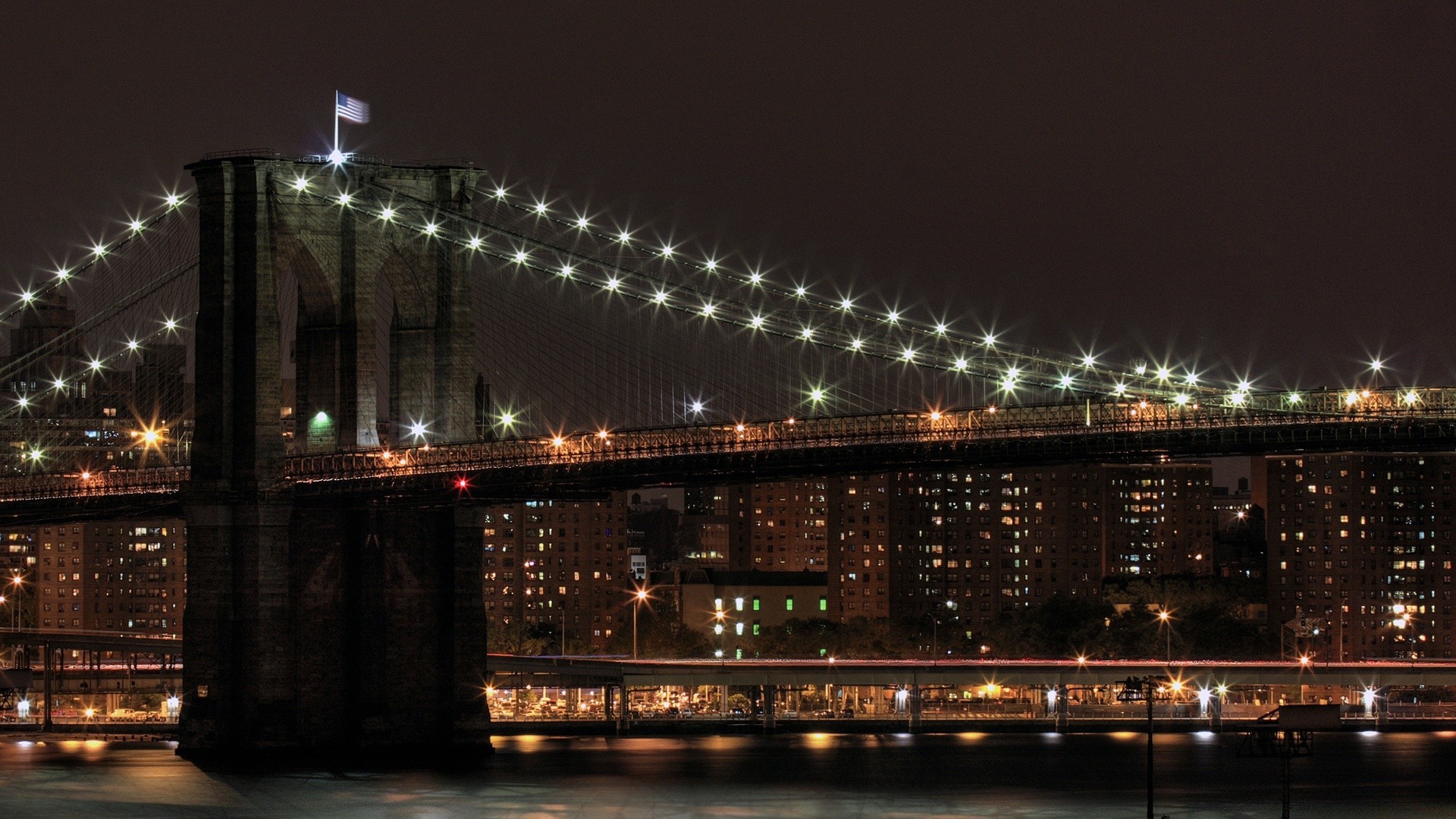 other city bridge city river architecture travel water urban light building evening dusk downtown traffic cityscape transportation system reflection sky street road skyline