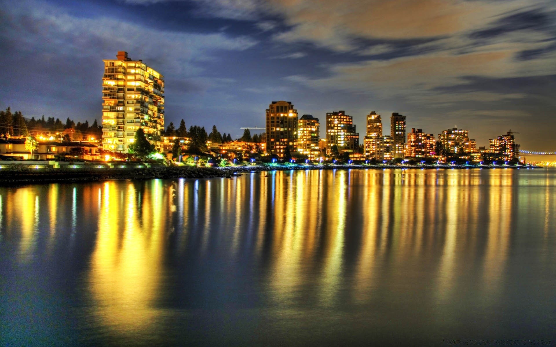 other city city water architecture sunset dusk cityscape reflection travel skyline evening downtown sky river building waterfront skyscraper urban bridge