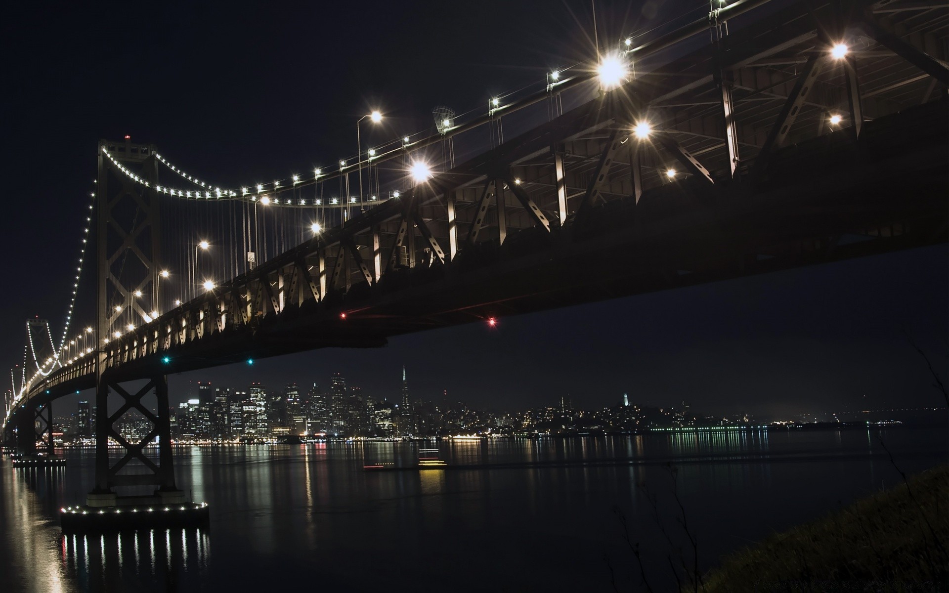 andere städte brücke fluss hängebrücke wasser stadt transportsystem abend architektur verbindung reisen dämmerung sonnenuntergang licht autobahn himmel straße verkehr sehnen reflexion