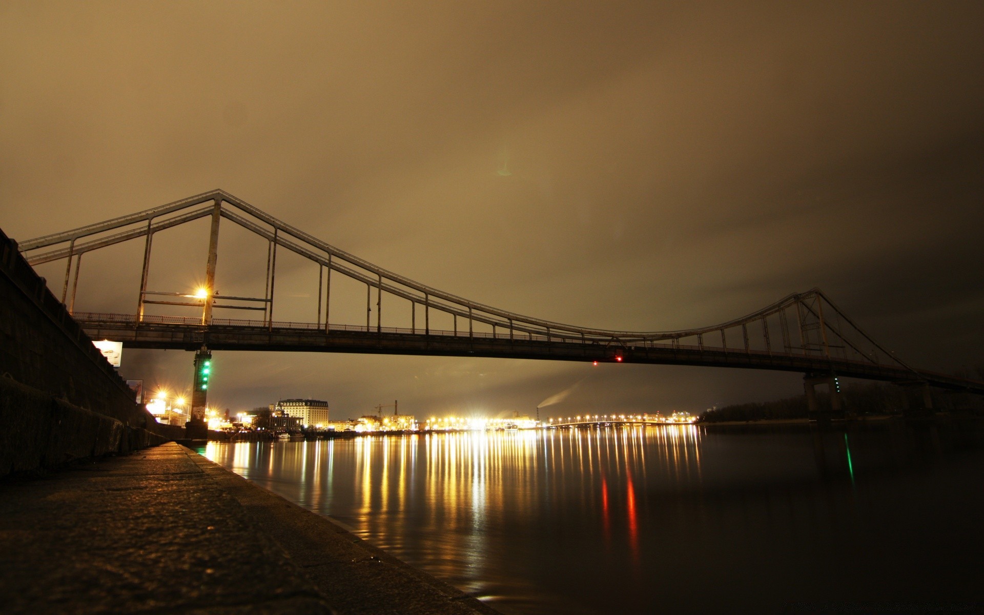 other city bridge water sunset river suspension bridge travel city evening dusk dawn architecture sky connection transportation system light reflection urban sea