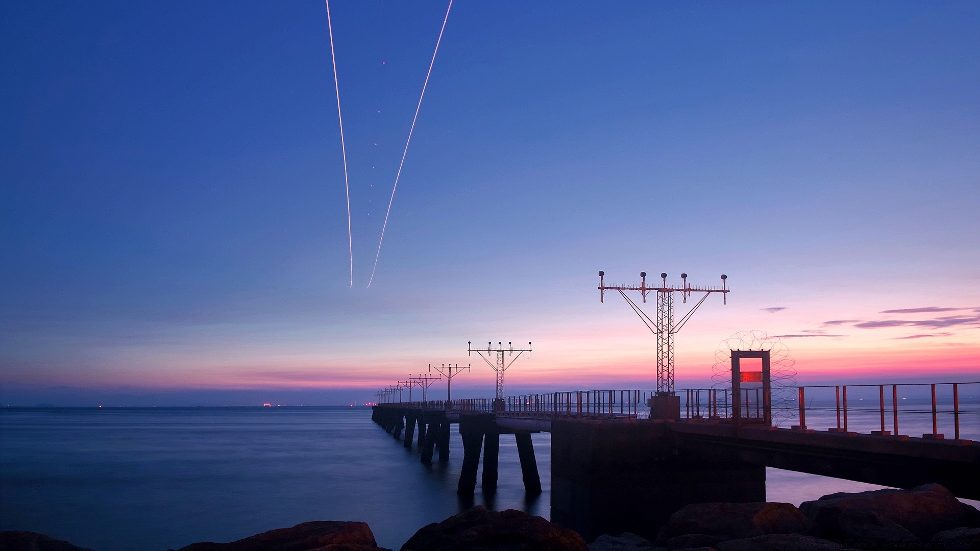 other city water sunset sea dusk dawn sky ocean evening landscape bridge travel seashore beach pier light transportation system reflection