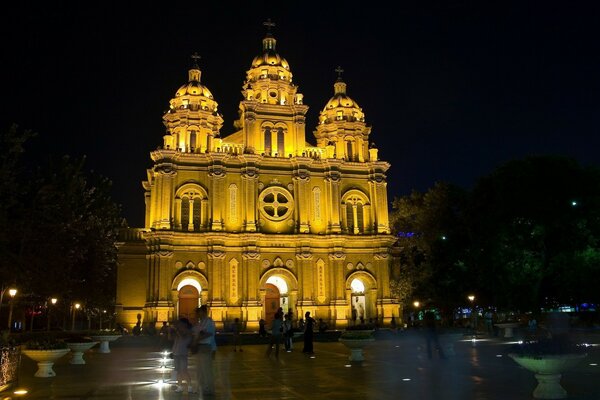 Church at night in the light of lanterns