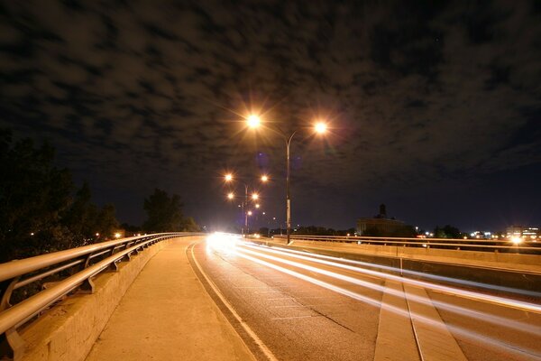 Night expressway in the light of lanterns