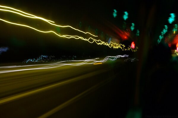 Blurred lights on the road at high speed