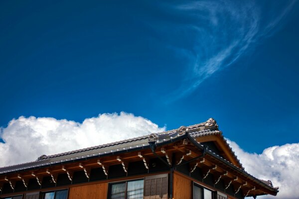 The interior of the roof of the house against the sky