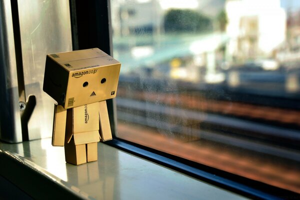 Paper man on the windowsill