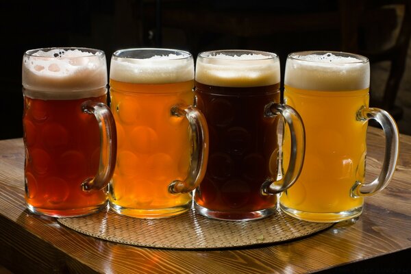 4 types of beer with foam