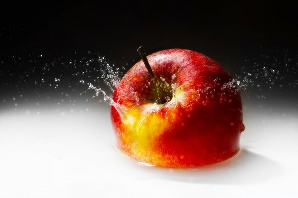 Juicy apple in the spray