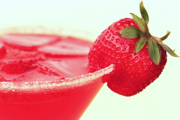 Sweet strawberry cocktail with berries