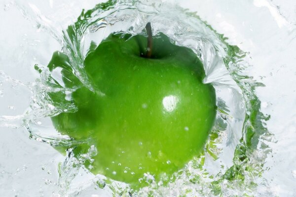 Macro apples in the water funnel