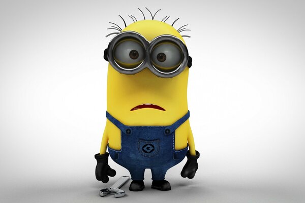 A minion in glasses with a key is at a loss