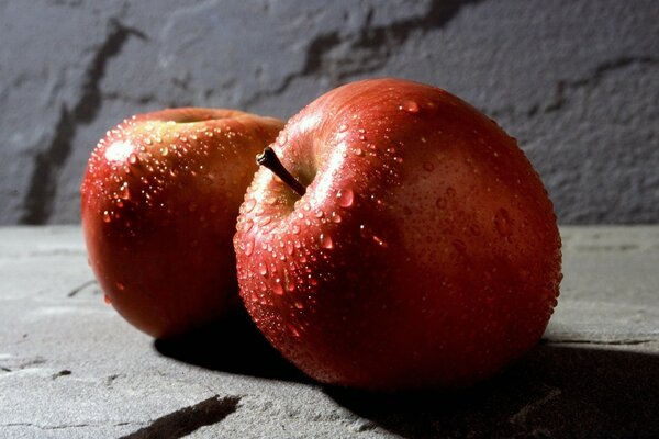 Still life of juicy fruits with water droplets