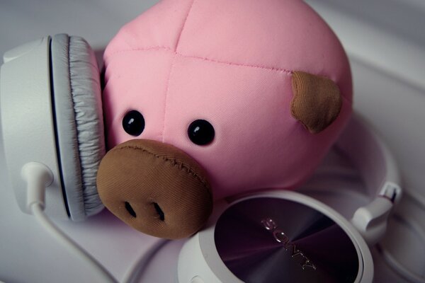 Pink Pig toy with headphones