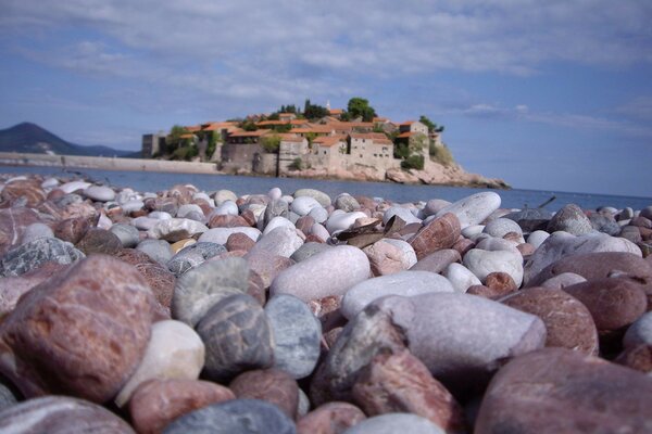 Rocks on the sea beach in cloudy weather