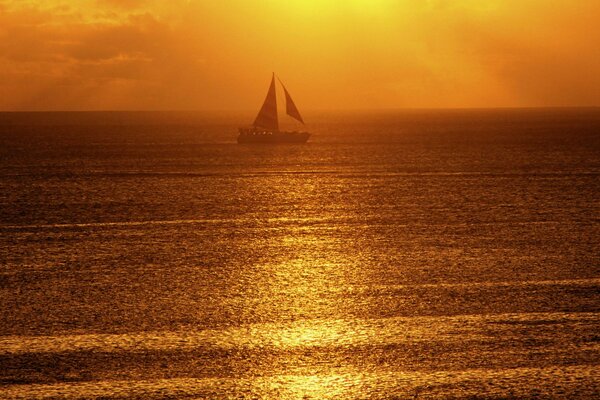 Sunset on the watery surface of the sail