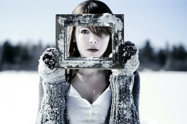 Portrait of a girl in the snow