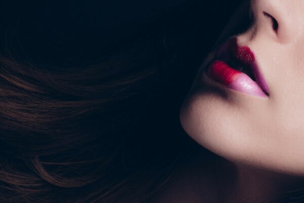 Women s lips with red lipstick