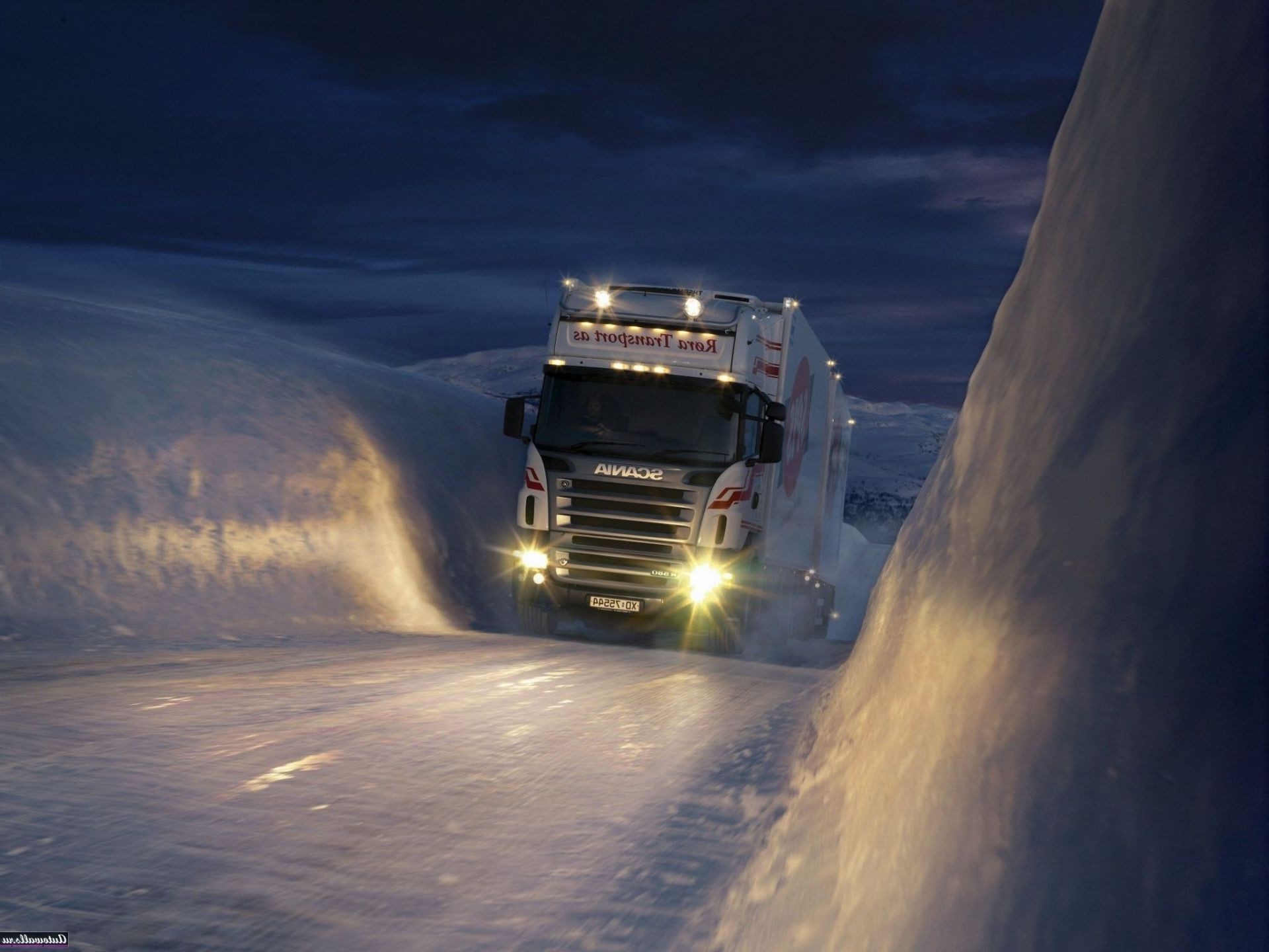 trucks transportation system winter snow vehicle travel road sunset sky light dawn car evening outdoors