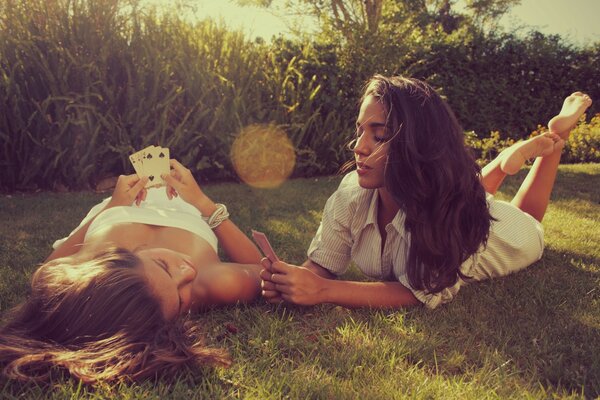 Two girls relaxing on the grass