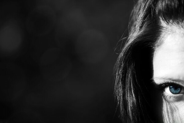 Dark portrait of a girl with eyes