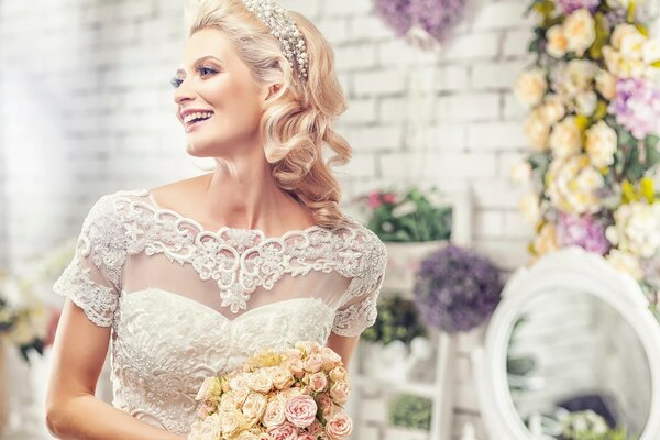 A gentle bride with a bouquet in her hands