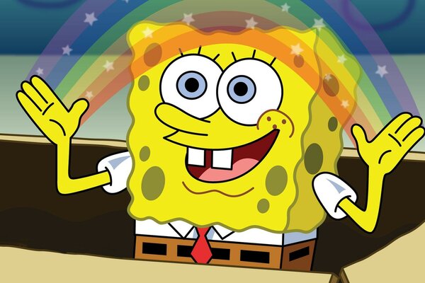 Spongebob kommt aus der Box und macht mit seinen Händen einen Regenbogen