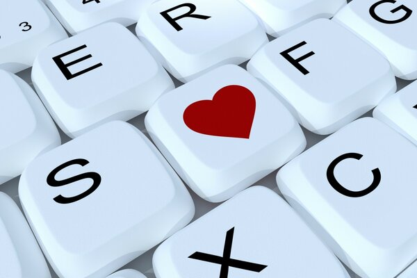 Foto teclado con un símbolo misterioso en forma de corazón