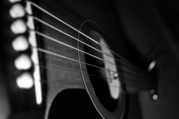 Black and white wallpaper with guitar strings