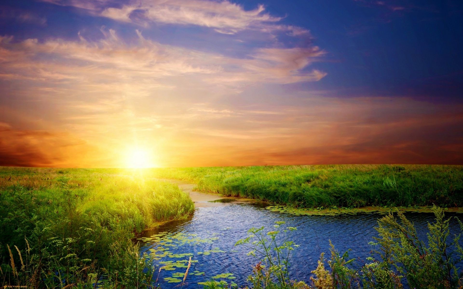 the sunset and sunrise dawn sunset landscape nature sun sky water lake grass fair weather outdoors rural summer reflection evening cloud light