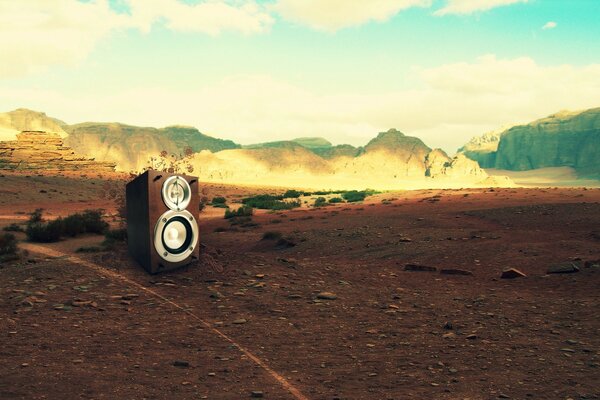 Speakers with music at sunset in the desert