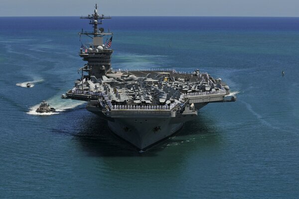 A mighty military floating vehicle on the water