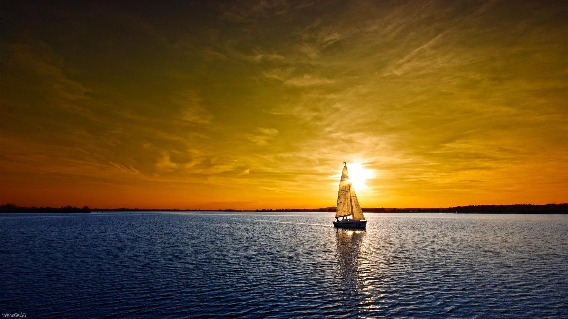 sea and ocean sunset water dawn dusk evening watercraft sun sky sea travel reflection ocean boat lake