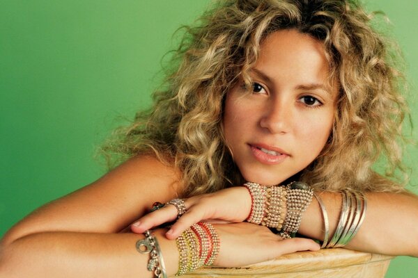 Portrait of a woman with many bracelets