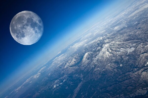 Moon and earth on the sky background